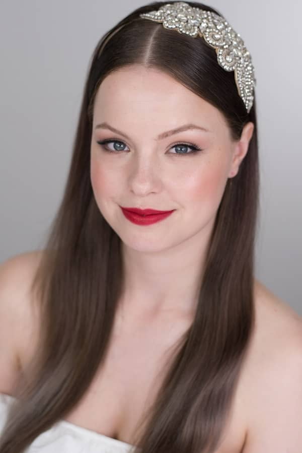 Sleek bridal hairstyle natural makeup for porcelain skin tone red lip