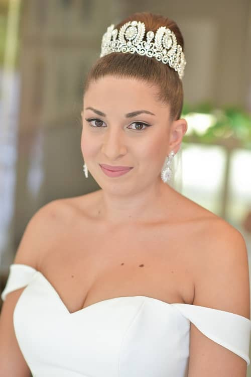 Simple bridal eye makeup rosy lipstick for wedding day top bun for wedding