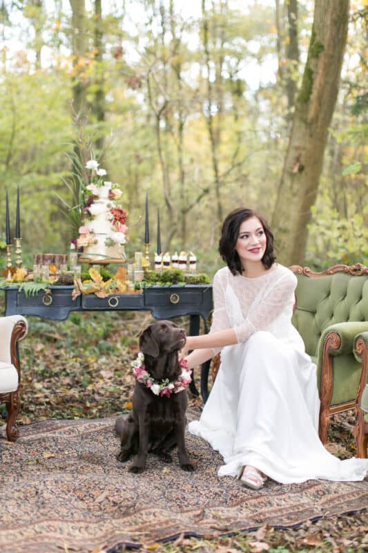 Loseley-Park Bride with short hair and berry lipstick in a woodland setting