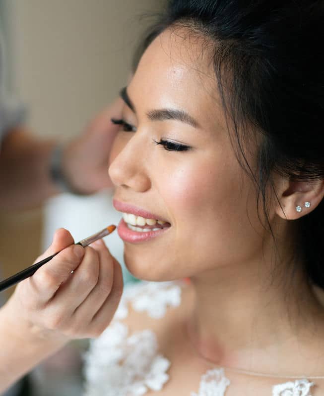 Hooded eyes bridal makeup for Asian bride getting ready for a wedding day