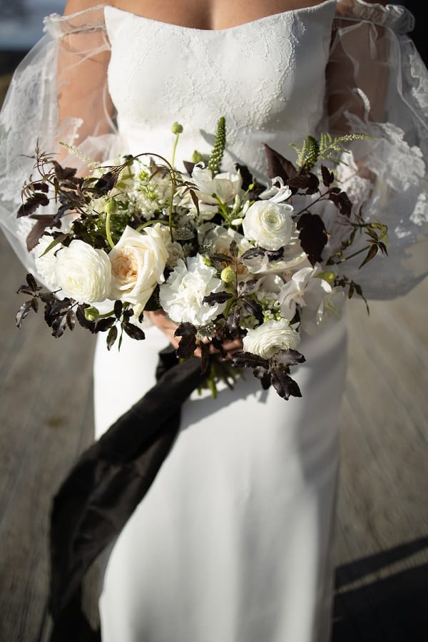 Monochrome wedding bouquet with white roses